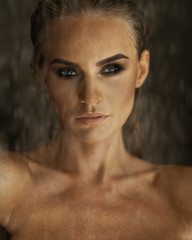portrait of a sexy fashionable girl in a shower