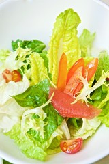 duck slices with pear slices and salad