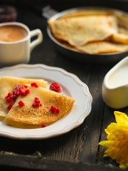pancakes crepes fritters with raspberries (pancakes with filling) Maslenitsa. food background. top view