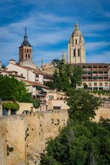 Fototapeta na wymiar Cityscape including the ramparts and the bell tower of the Cathedral, Segovia, Castilla y Leon, Spain