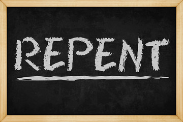 REPENT chalk text with hand drawn style on blackboard , Concept design for presentations and reports