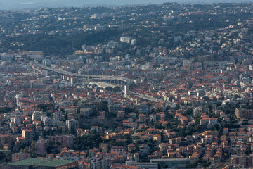 Fototapeta premium Nice view of the city at sunset from a height