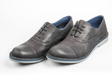 Blue men's shoes on white background.
