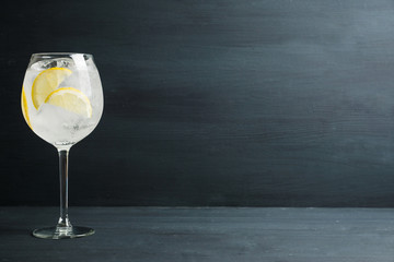 Gin based cocktail in wine glass. Selective focus. Shallow depth of field.