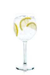 Gin based cocktail in wine glass isolated on white background. Selective focus. Shallow depth of...