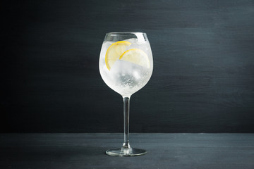 Gin based cocktail in wine glass. Selective focus. Shallow depth of field.