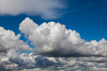 Naklejka premium Blue sky in white clouds