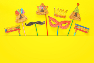 Purim celebration concept (jewish carnival holiday). Traditional hamantash cookies cutted from...