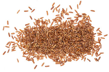 Lot of whole raw red rice pile flatlay isolated on white background