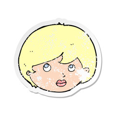 retro distressed sticker of a cartoon female face looking upwards