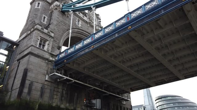 Pan of Tower Bridge, bascule and suspension bridge in London. 4K untouched