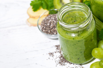 healthy green fruit and vegetable smoothies on white background