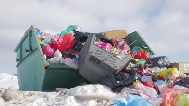 Garbage is pile lots dump, many garbage plastic bags black waste at walkway community village, bags bin of plastic waste, garbage waste lots junk dump.