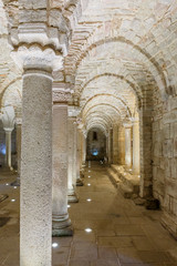 Colonnade in an old underground crypt