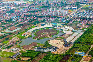 Aerial view of Shanghai Pudong area agricultural land and rural suburban area in China clear day weather