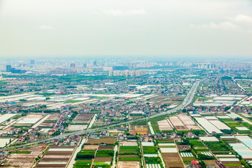 Fototapeta na wymiar Aerial view of Shanghai Pudong area agricultural land and rural suburban area in China clear day weather