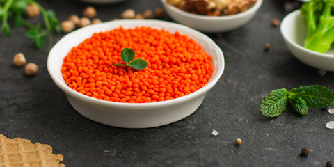 lentils, healthy food concept (legumes, greens, spinach and more) superfood. Food background