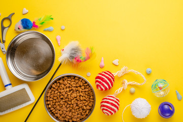 Zoomarket and pet store.Catty background, with cat accessories on a yellow background.Cat .Flat-lay