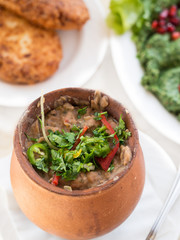 Lobio, a traditional Georgian bean dish in a clay container.