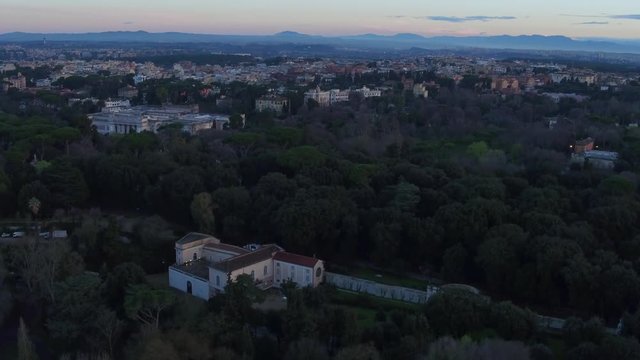 Drone view - Rome, Villa Borghese to Galleria Nazionale d'Arte Moderna e Contemporanea tracking forward - twilight