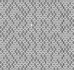 Fototapeta premium Seamless black and white monochrome texture consisting of circles and segments, made in the form of a complex maze