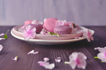 Obraz na płótnie Canvas pink cakes and pink flowers art food photography