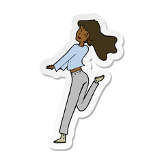 sticker of a cartoon happy girl kicking out leg