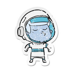 Obraz premium distressed sticker of a cartoon confident astronaut
