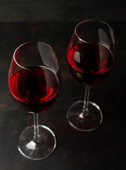 Red wine glasses on the background  stone