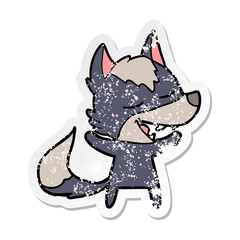 distressed sticker of a cartoon wolf laughing