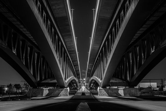 Fototapeta Under a big Bridge at Night, Bridge Construction, black and white, bottom of a bridge