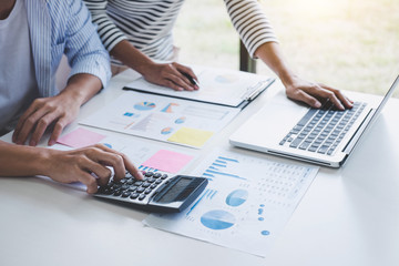 Business team collaboration discussing working analysis with financial data and marketing growth report graph in team, Meeting Talking Brainstorming Communication Concept