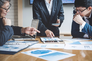 Co working conference, Business team colleagues discussing working analysis with financial data and marketing growth report graph in team, Business finances and accounting concept
