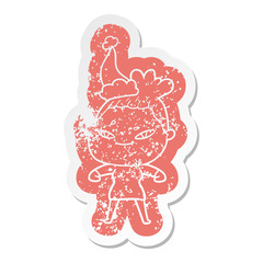 cartoon distressed sticker of a woman wearing santa hat