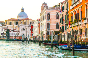 Sunny day in Venice. Narrow streets, canals and beautiful architecture.