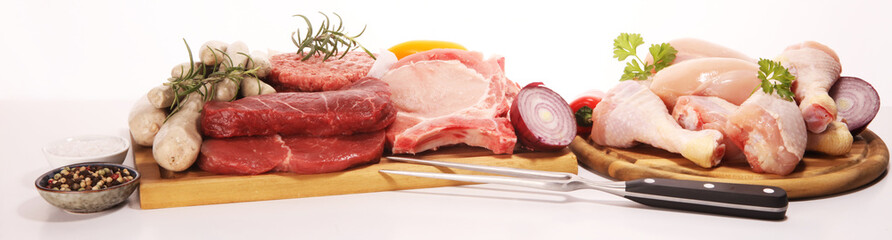 raw meat. Different types of raw pork meat, chicken and beef with spices and herbs