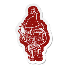 cartoon distressed sticker of a astronaut woman explaining wearing santa hat
