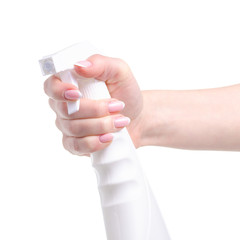White cleaning spray in hand on white background isolation