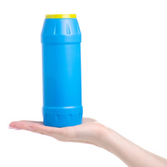 Blue bottle detergent powder in hand on white background isolation