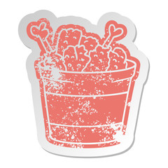 distressed old sticker bucket of fried chicken