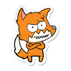 sticker of a cartoon grinning fox