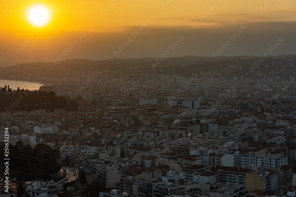 Sticker Nice view of the city at sunset from a height