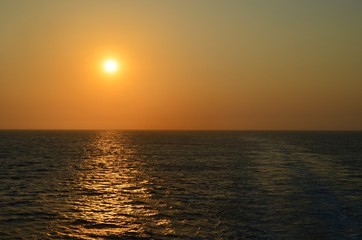 wake trail in the sunset