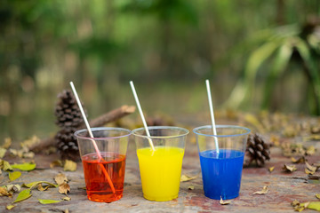 Epoxy resin in cup for casting Stabilizing wood and pine cone hybrid