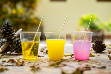 Epoxy resin in cup for casting Stabilizing wood and pine cone hybrid