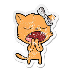Obraz na płótnie Canvas distressed sticker of a cartoon yawning cat