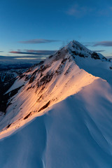 Aerial view of a beautiful Canadian Landscape during a winter sunset. Taken near Squamish, North of Vancouver, British Columbia, Canada.