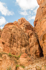 Fototapeta premium Amazing red rock in historical and archaeological Petra city called the Rose City. Petra is one of the New Seven Wonders of the World.