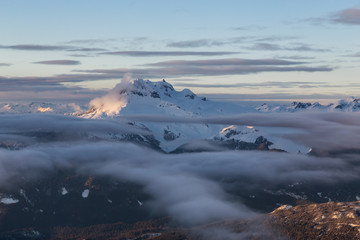 Aerial view of a beautiful Canadian Landscape during a winter sunset. Taken north of Vancouver, British Columbia, Canada.
