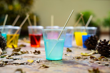 Epoxy resin in cup for casting Stabilizing wood and pine cone hybrid